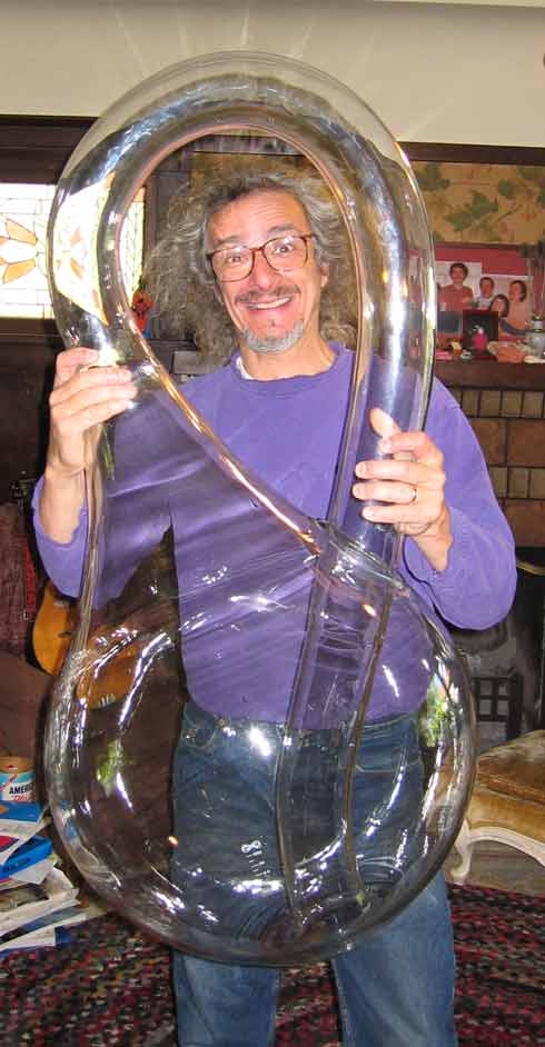 Cliff Stoll behind the meter tall Klein Bottle