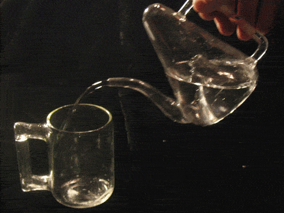 Pyramid Teapot pouring into a Cup of Tantalus