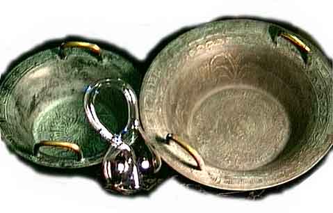 Medium and Big Spouting Bowls alongside a Klein Bottle