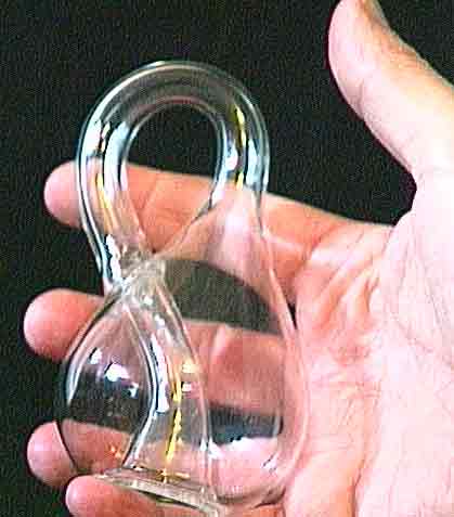 A baby Klein bottle in the hand of Cliff Stoll -- he's got the whole world in his hand!